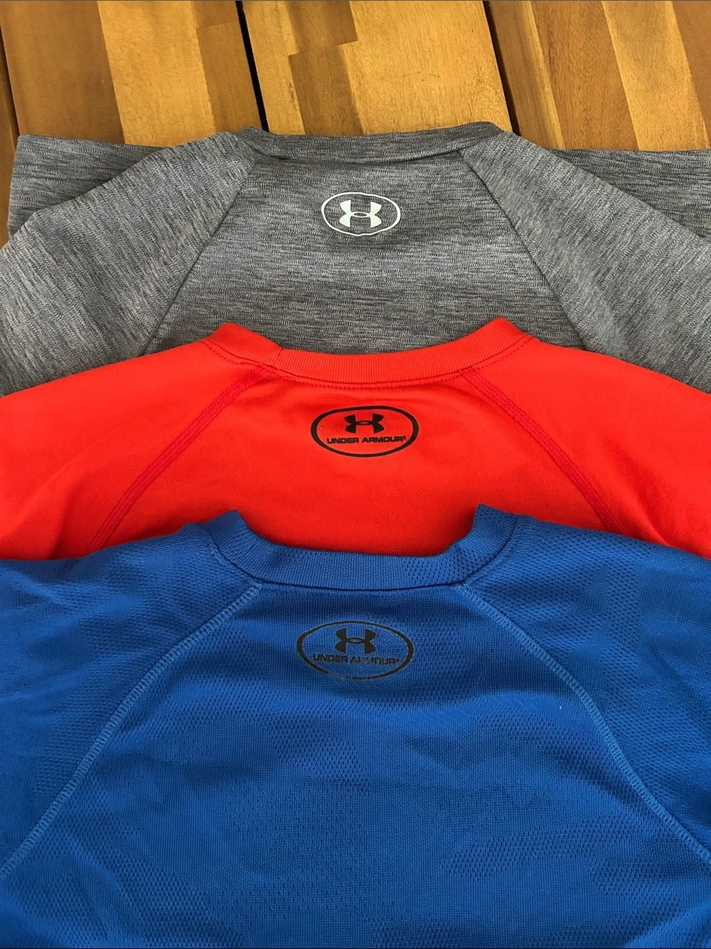 Under Armour Kids Short Sleeve Tees in Red, Blue, Gray